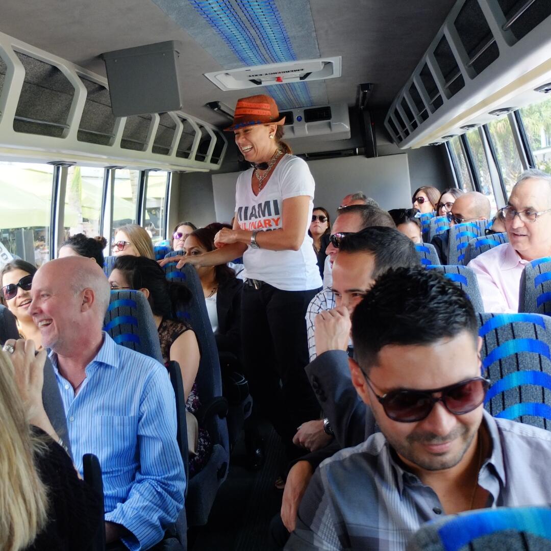 A group of people on a private bus.
