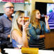 A group of people enjoying a glass of wine in a bar during one of our private tours.